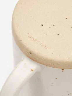 DOR & TAN Everyday Mug - Speckled White 10 DOR & TAN Everyday Mug - Speckled White -Quality Home Furnishings Store 78498 F DOR 26 TAN EVERYDAY MUG SPECKLED WHITE SS22 GOODHOOD 205 857df20f 45dc 4953 afdd 5f66aa060168
